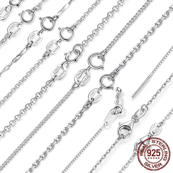 Assorted 925 sterling silver O-chain and link necklaces with lobster clasp, studio flat-lay on white background — OmniVivo