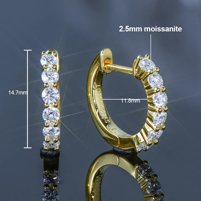 925 sterling silver hoop earrings plated in 14K yellow gold, set with 2.5 mm round-cut moissanite; technical diagram showing 14.7 mm height and 11.8 mm inner diameter on dark reflective background — OmniVivo