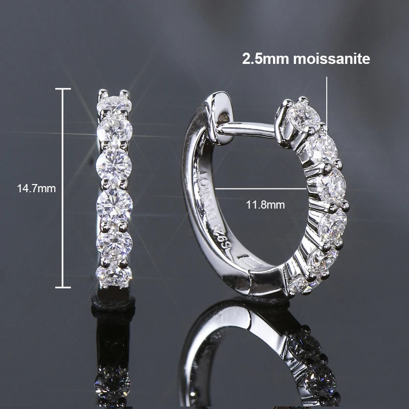 sterling silver hoop earrings in white gold tone (rhodium finish), set with 2.5 mm round-cut moissanite; technical diagram showing 14.7 mm height and 11.8 mm inner diameter on dark background — OmniVivo