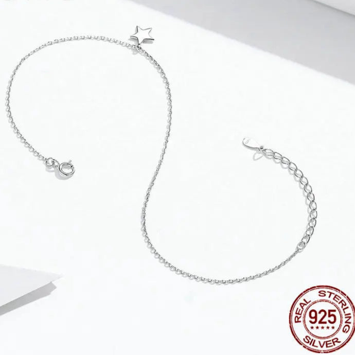 925 sterling silver star anklet with extender chain and lobster clasp on a white background, “Real Sterling Silver 925” stamp visible, adjustable length.
