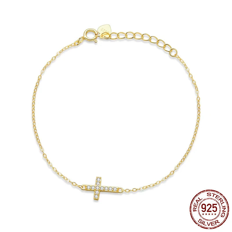 Adjustable 14K gold plated 925 sterling silver cross bracelet with zircon accent on a link chain — OmniVivo