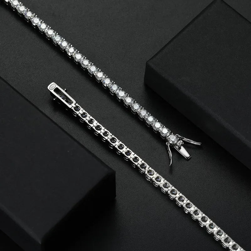 Front and back view of moissanite tennis bracelet in 925 sterling silver with open clasp on a black background — OmniVivo