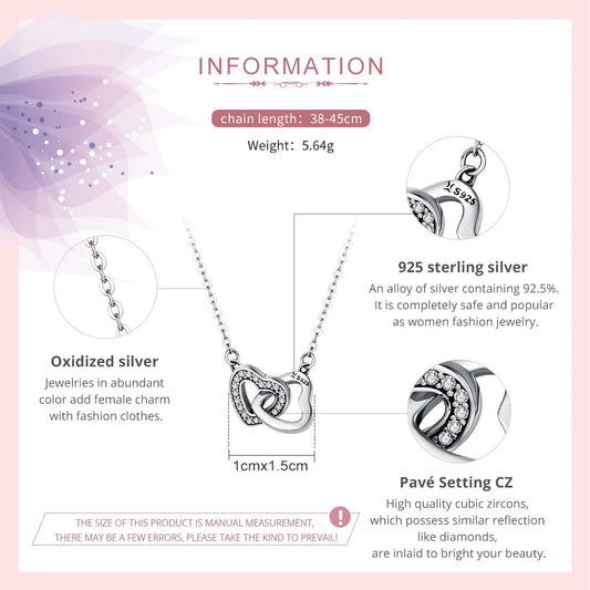 Infographic detailing the Amira Interlocked Hearts Necklace: showcasing its 38-45cm adjustable chain, 5.64g weight, 925 sterling silver material, oxidized silver finish, and dazzling Pavé Setting CZ stones, highlighting its quality and design.
