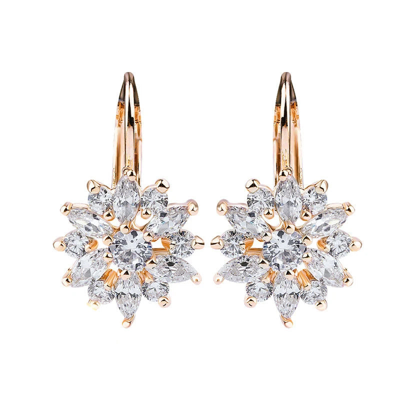 18K rose gold–plated flower cluster leverback earrings set with AAA zircon crystals (round and marquise cuts), shown on a white background — OmniVivo