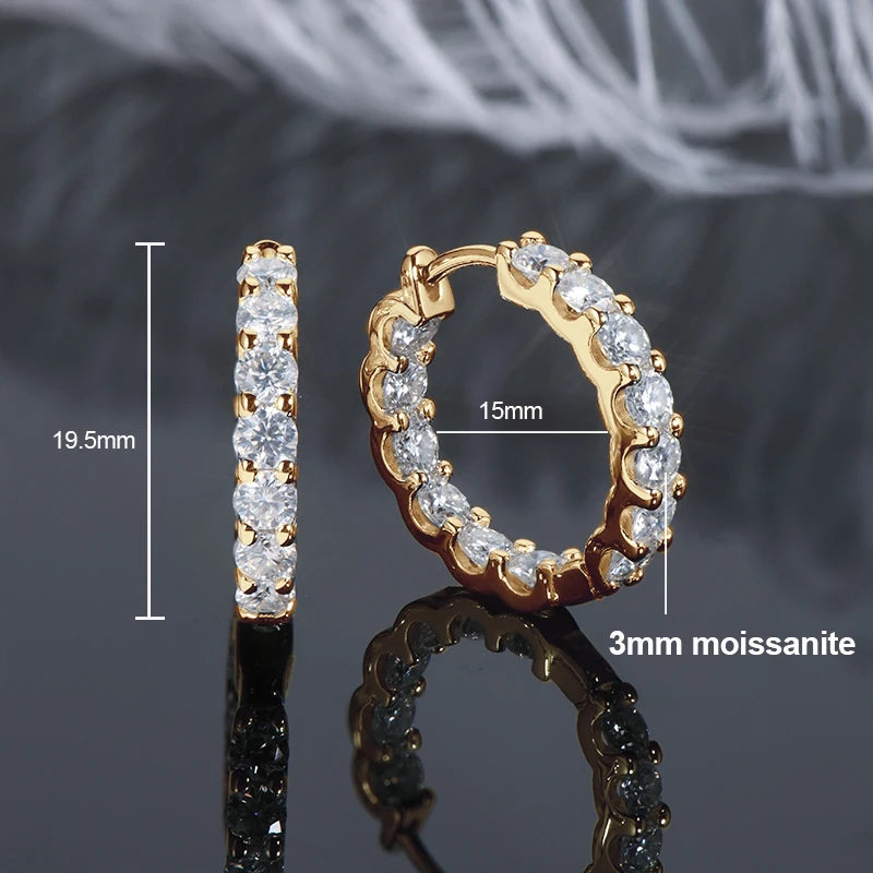 925 sterling silver hoop earrings plated in 14K yellow gold, set with 3 mm round-cut moissanite; technical diagram showing 19.5 mm height and 15 mm inner diameter on dark reflective background — OmniVivo
