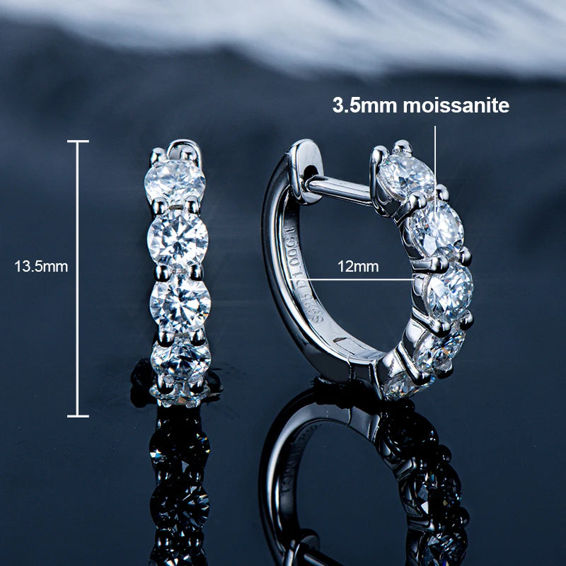 925 sterling silver hoop earrings in white gold tone (rhodium finish), set with 3.5 mm round-cut moissanite; technical diagram showing 13.5 mm height and 12 mm inner diameter on dark reflective background — OmniVivo