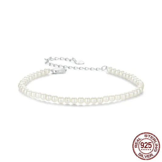 Pearl beaded bracelet in 925 sterling silver with shell pearls, adjustable 16–22 cm, on white background — OmniVivo.