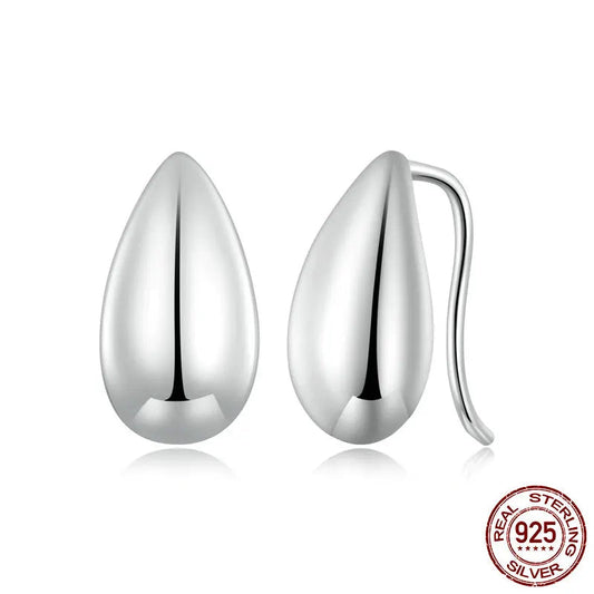 Glossy teardrop earrings in 925 sterling silver, minimalist waterdrop design, studio shot on white background — OmniVivo