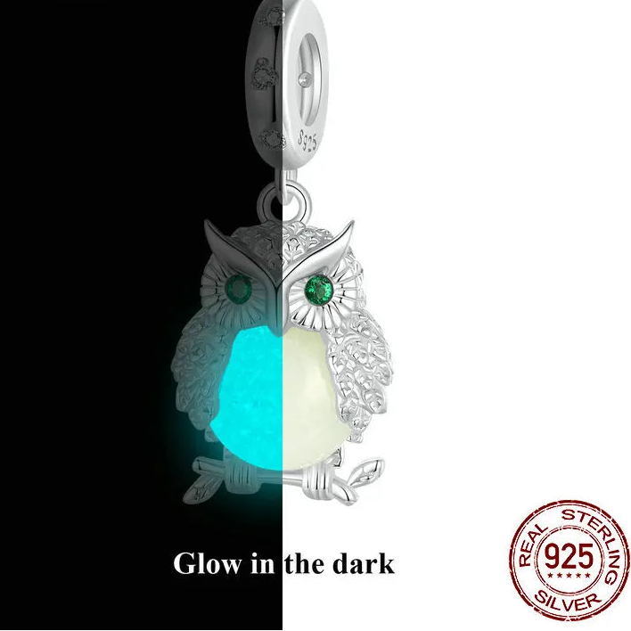 Glow-in-the-dark owl pendant charm in 925 sterling silver with green eyes and zircon accents.