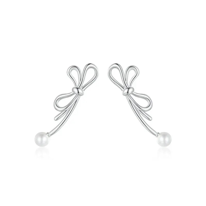 Gold bow-shaped stud earrings in 925 sterling silver on a white background.