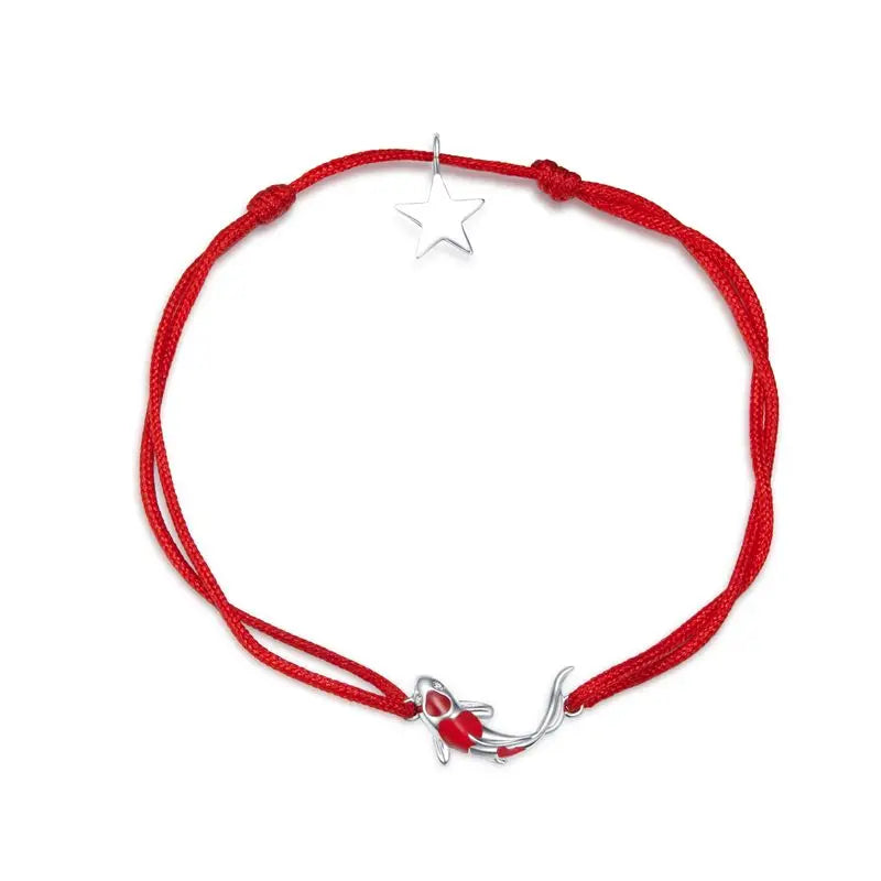 Red rope bracelet with 925 sterling silver lucky fish and star charms, adjustable knot, displayed on a white background — OmniVivo