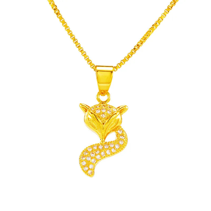 24K (9999) pure gold fox pendant necklace with zircon accents on a box chain — front view on white background.