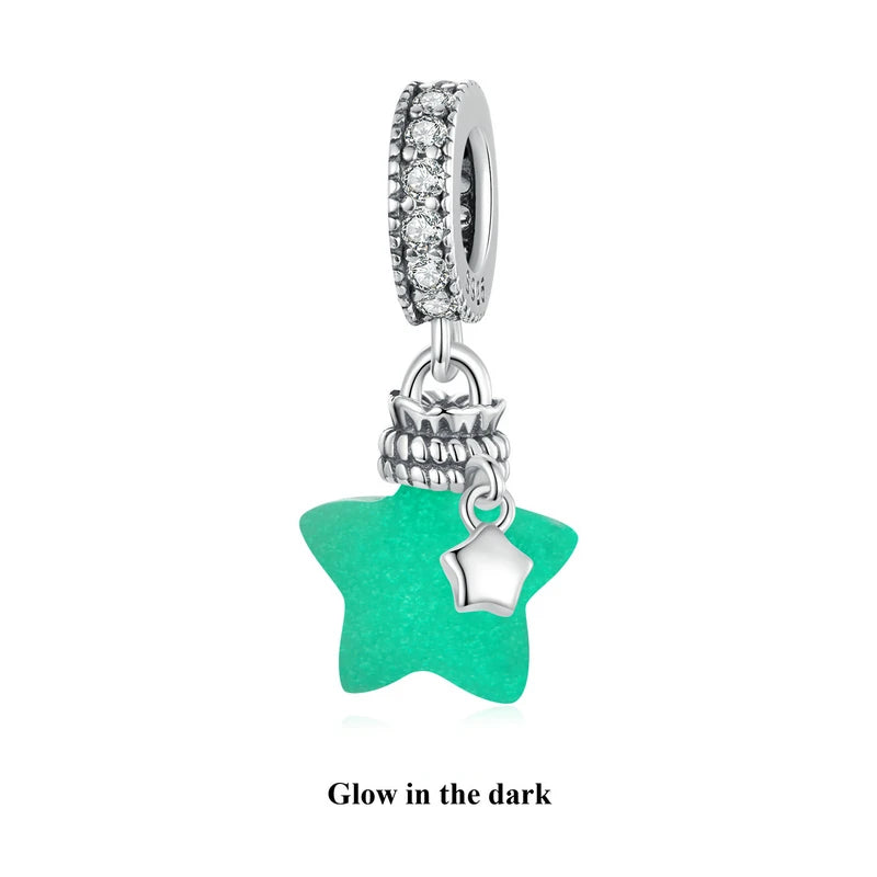 Glow-in-the-dark star charm in 925 sterling silver with zircon accent on a white background.