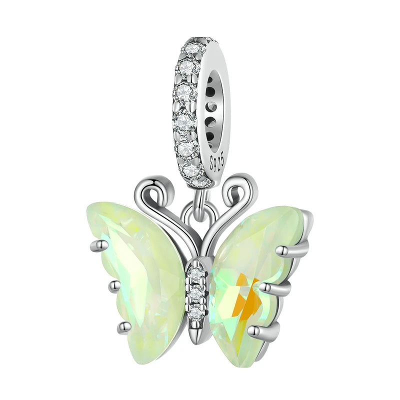 925 sterling silver butterfly charm bead with opal-effect wings and pavé bail on a white background.