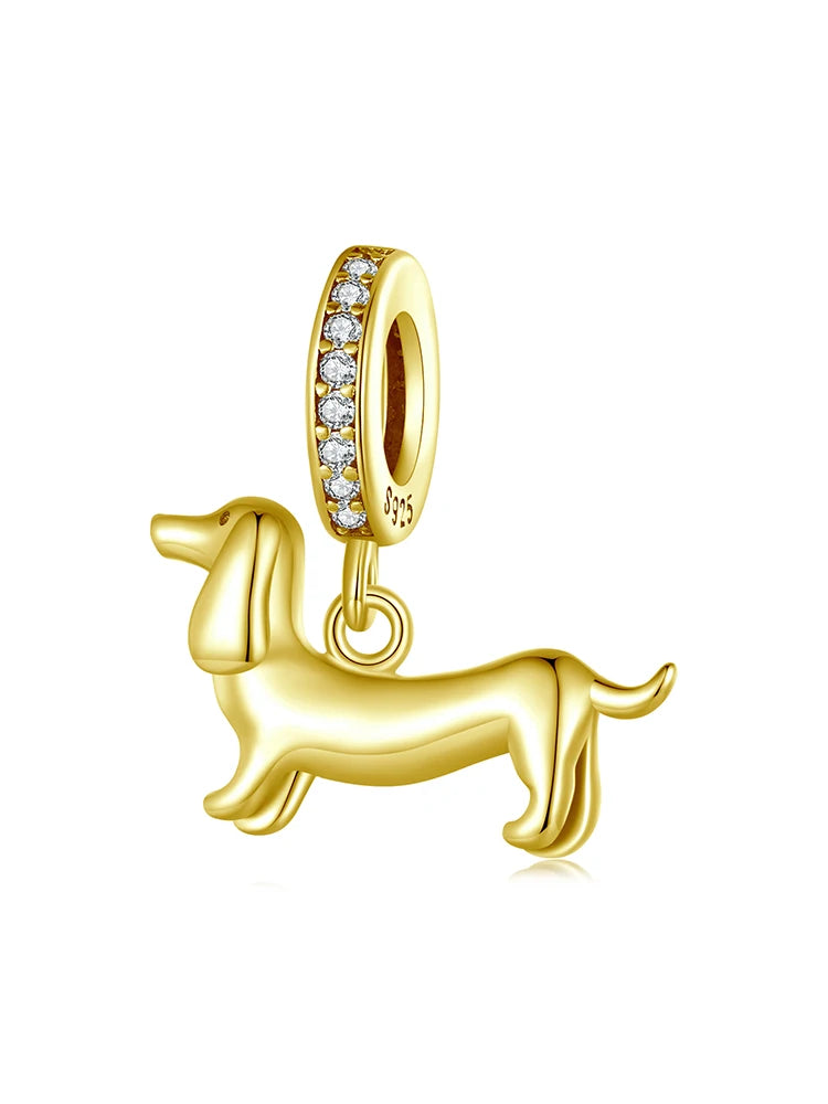 14K gold-plated 925 sterling silver dachshund dog charm bead with pavé bail on a white background.