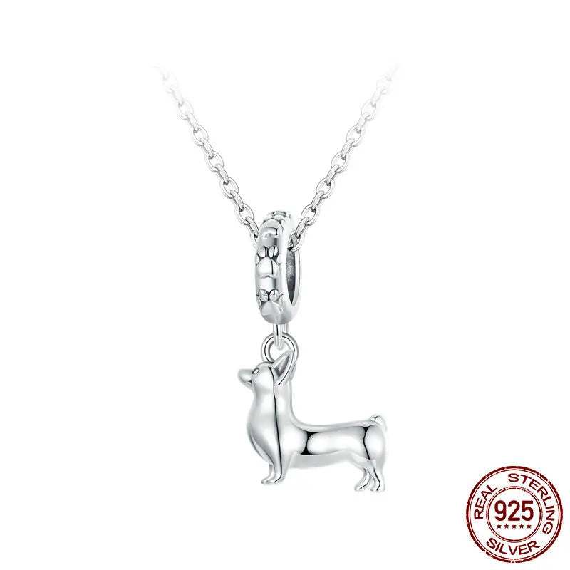 925 sterling silver dachshund dog pendant on a chain, photographed on a white background.