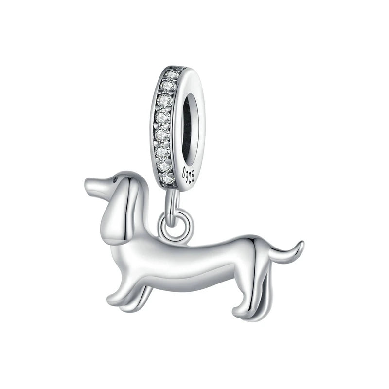 925 sterling silver dachshund dog charm bead with pavé ring bail on a white background.