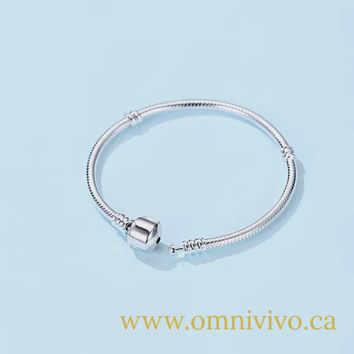 925 sterling silver snake chain bangle, 3 mm, barrel clasp on a light blue background (adjustable 17–22 cm)