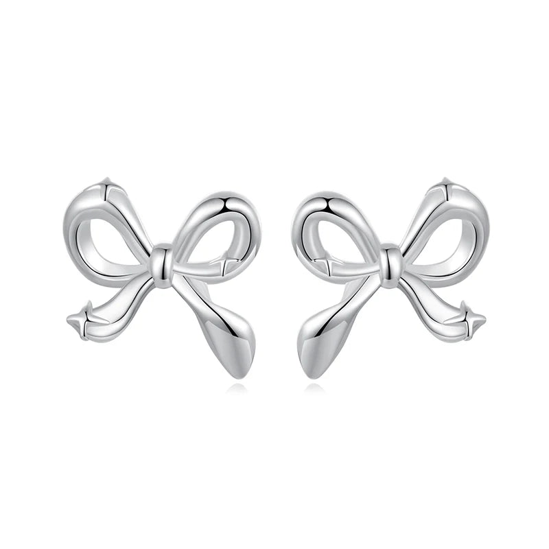 925 sterling silver bowknot stud earrings, white-gold plated, on a white background.