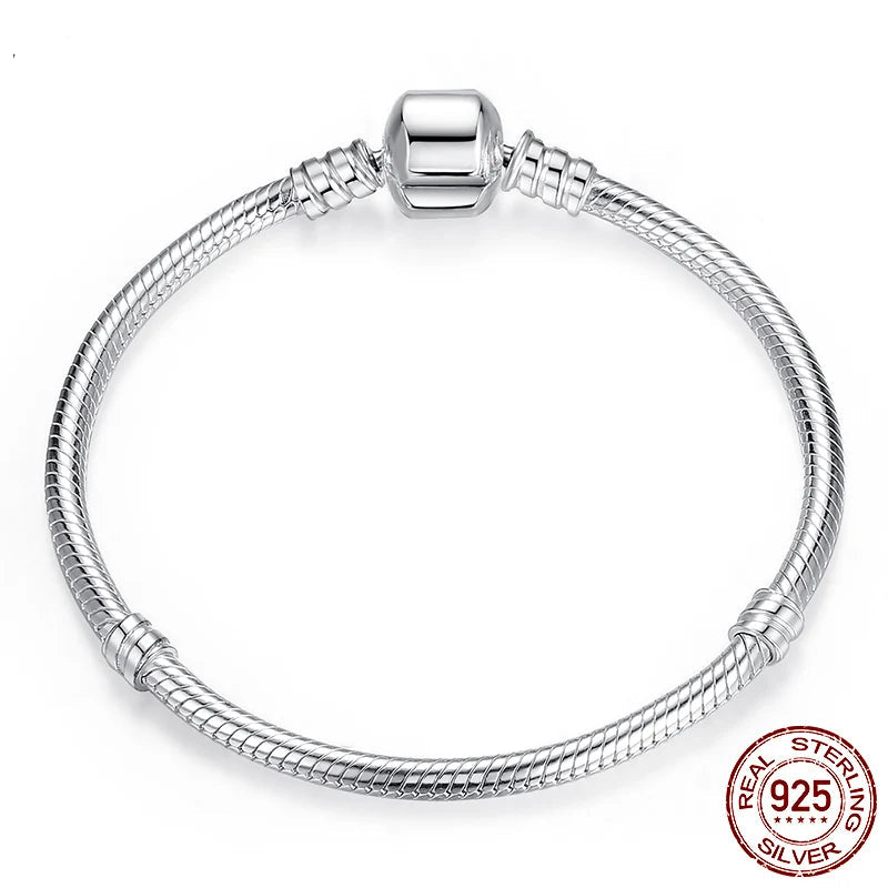 925 sterling silver 3 mm snake chain charm bracelet with barrel clasp and S925 stamp on a white background